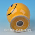 Ceramic smiling face coin bank